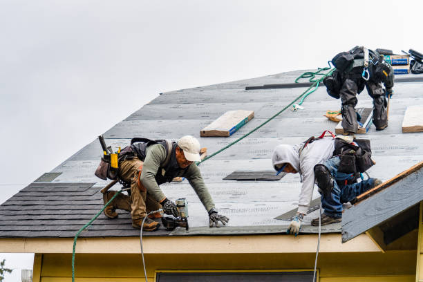 Professional Roofing technician working in Micaville, NC